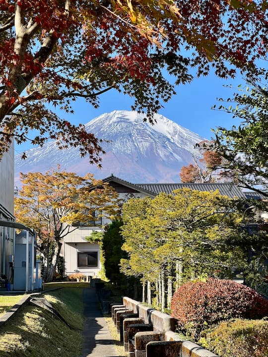 Stunning view of Mount Fuji from the Fuji Matsuzono Hotel, surrounded by tranquil landscapes