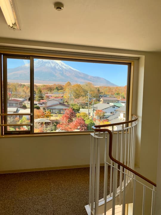 A breathtaking view of Mount Fuji from the stairwell of Fuji Matsuzono Hotel