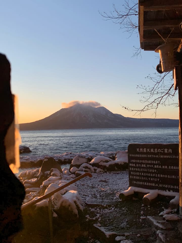 Immersing in the soothing waters at sunrise at Marukoma Hot Spring Hotel