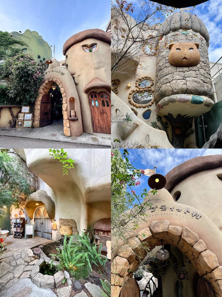 Whimsical cat-themed decorations in Tokyo Kichijōji Petit Mura, including cat-shaped fountains and walls adorned with cat motifs