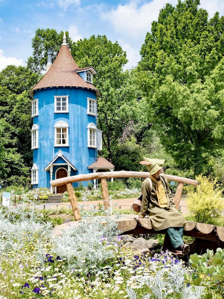 Enchanting scene from Tokyo MOOMINVALLEY PARK featuring whimsical buildings and Moomin characters