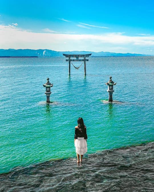 Einoo Tsurugi Shrine floating on the sea during the day in Kumamoto, Japan