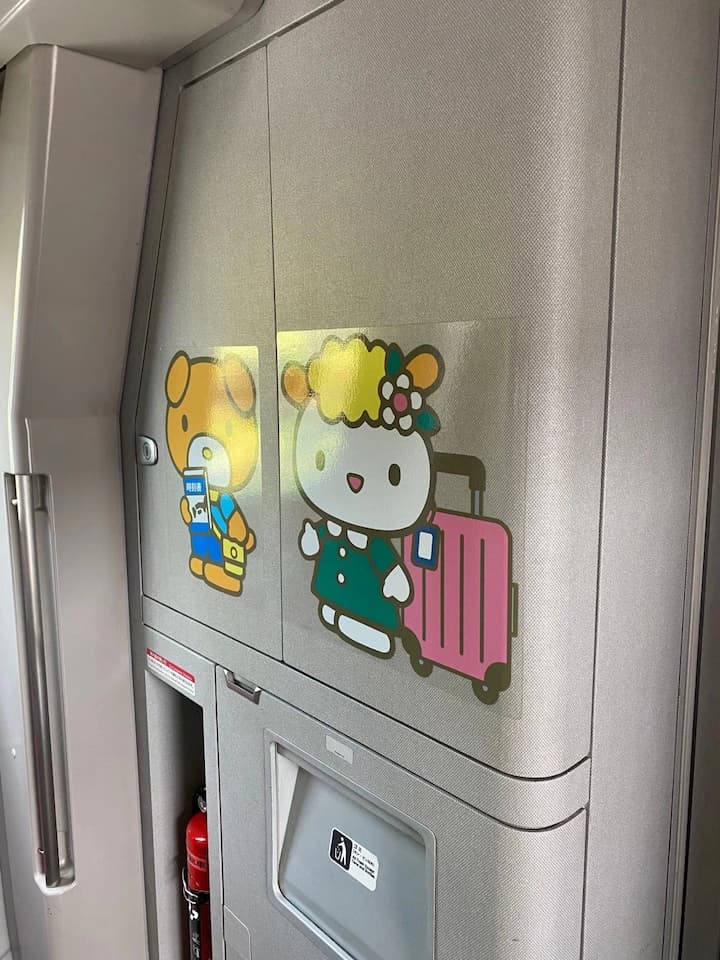 The Hello Kitty Shinkansen Bullet Train, with its signature pink exterior and adorable Hello Kitty-themed interior décor, creating a magical experience for passengers