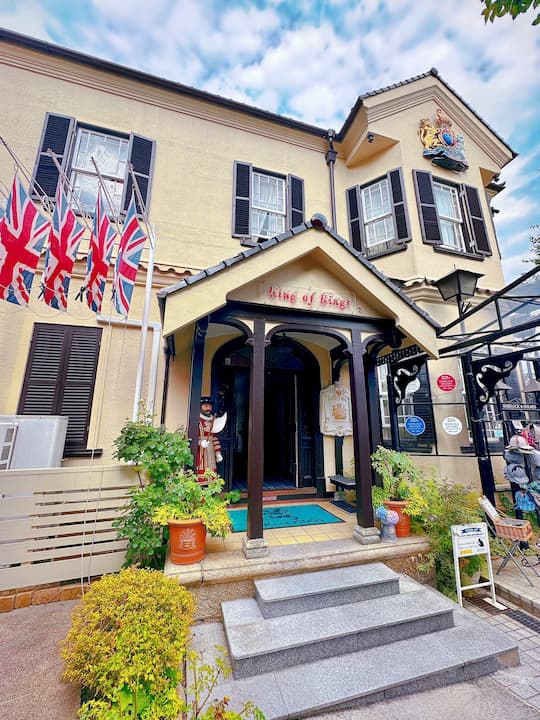 Historic consulate buildings along the sloped street of Kitano Ijinkan-Gai, showcasing foreign architecture in Kobe