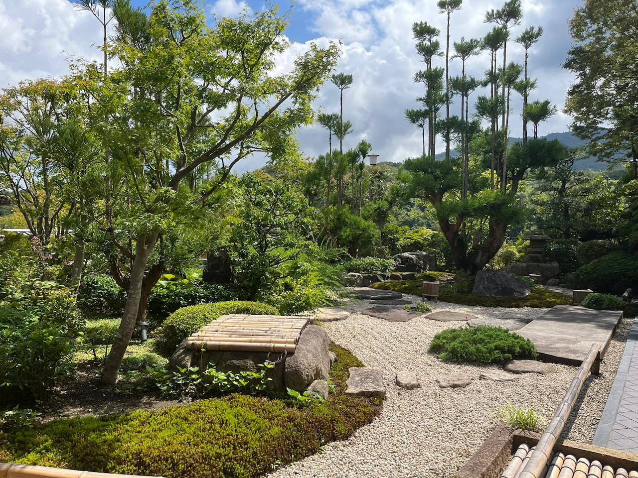 Japanese-style garden at Ginsuisou Choraku, featuring traditional landscaping and a serene atmosphere