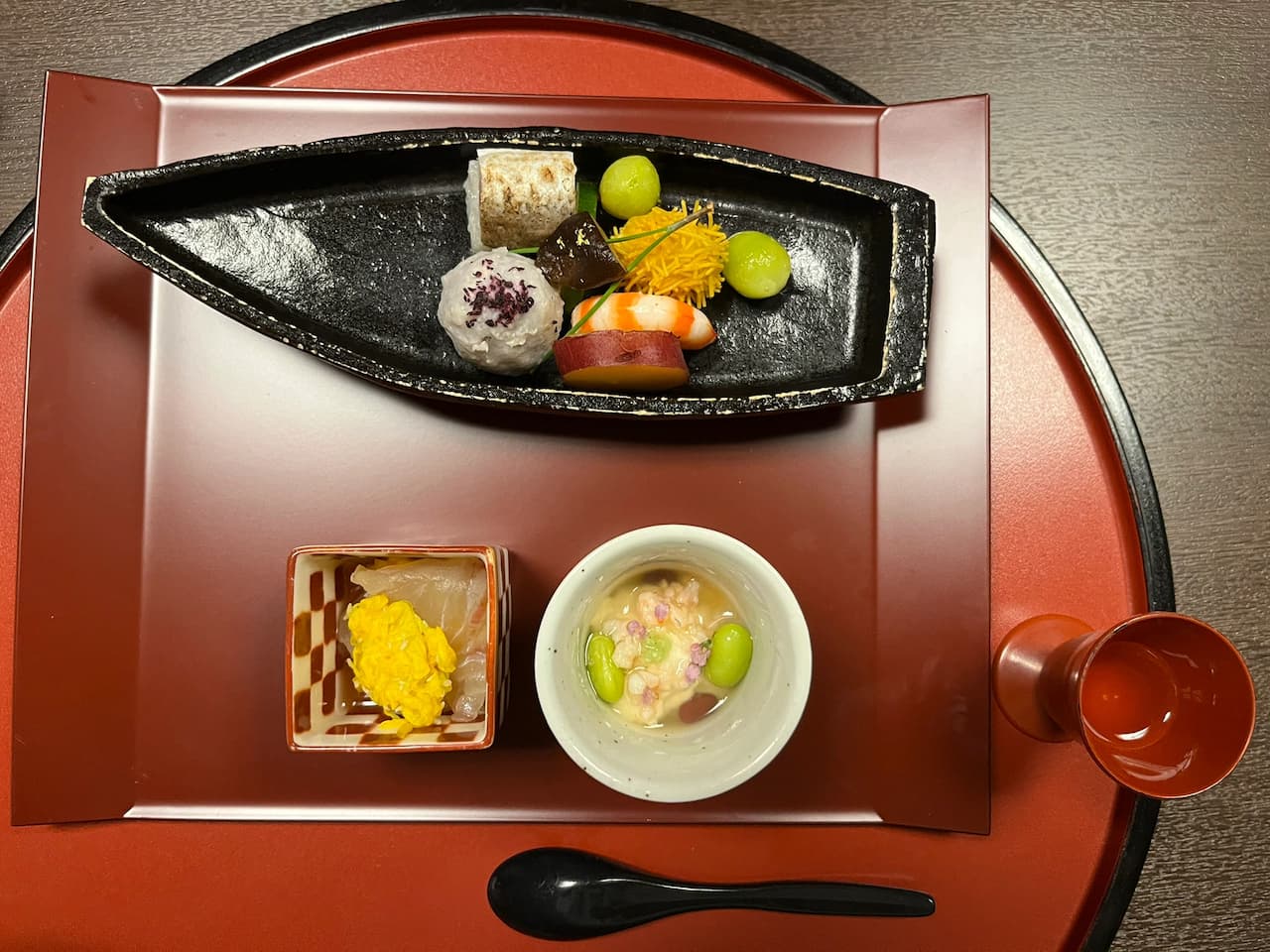 Exquisite kaiseki dinner served in the privacy of the room at Ginsuisou Choraku, featuring a variety of traditional Japanese dishes