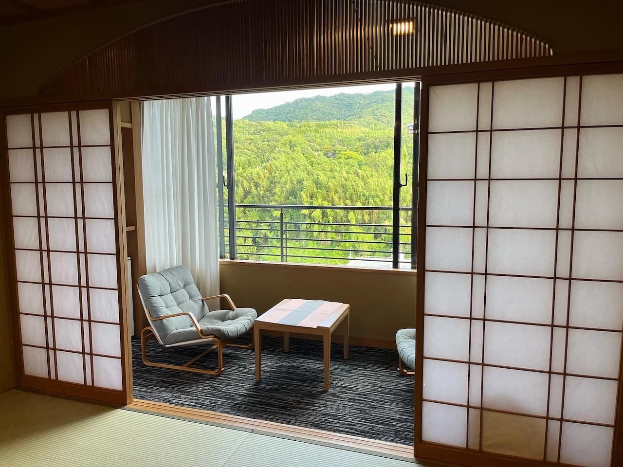 Comfortable and inviting room at Ginsuisou Choraku, designed for relaxation and tranquility