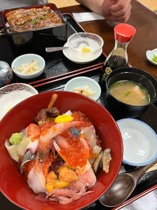 Exquisite kappo cuisine, including sashimi rice bowls and grilled eel in Uoshige, a restaurant in Mount Fuji