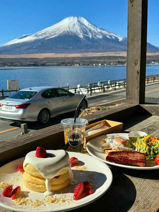 Savoring a delicious pancake at The Park Café with a breathtaking view of Mount Fuji