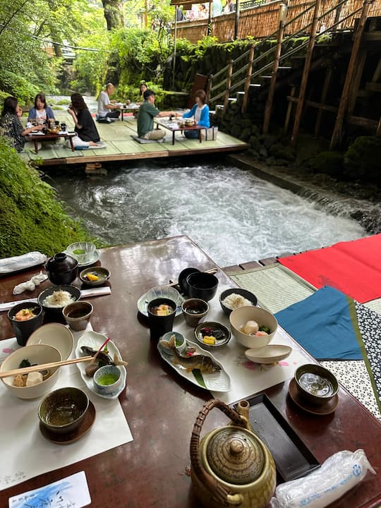 Riverside dining at Kibune Kawadoko restaurant in Kyoto