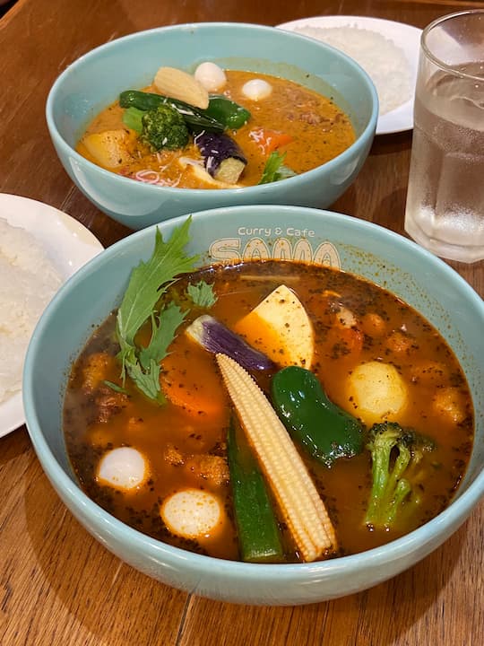 Soup curry with rice at Sama Curry Meijijingumae